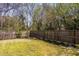 Fenced backyard with grassy lawn at 807 E Edenton St, Raleigh, NC 27601