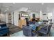 Modern basement dining area with glass table and grey chairs at 807 E Edenton St, Raleigh, NC 27601