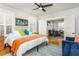 Spacious bedroom with king-size bed and access to additional rooms at 807 E Edenton St, Raleigh, NC 27601