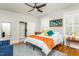Bright bedroom featuring a king-size bed and built-in shelving at 807 E Edenton St, Raleigh, NC 27601