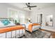 Charming bedroom with two twin beds and an ensuite bathroom at 807 E Edenton St, Raleigh, NC 27601