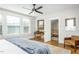 King bed, ceiling fan, and access to a Bedroom at 807 E Edenton St, Raleigh, NC 27601