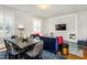 Open dining area with seating for six and hardwood floors at 807 E Edenton St, Raleigh, NC 27601