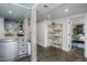 Open hallway with gold shelving and view into bedroom at 807 E Edenton St, Raleigh, NC 27601