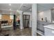 Open-concept kitchen with stainless steel appliances and a dining area at 807 E Edenton St, Raleigh, NC 27601