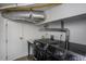 Basement laundry room with washer, dryer, and storage at 807 E Edenton St, Raleigh, NC 27601