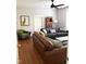 Comfortable living room with hardwood floors and brown leather couch at 807 E Edenton St, Raleigh, NC 27601