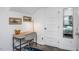 Small home office with a desk, chair and mirror at 807 E Edenton St, Raleigh, NC 27601