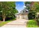 Charming two-story brick home with a spacious driveway and a two-car garage at 81002 Alexander, Chapel Hill, NC 27517