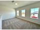 Spacious bonus room with carpet flooring and abundant natural light at 100 S Stonemill Trl # Homesite 234, Clayton, NC 27520