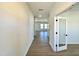 Bright hallway with light flooring, leading to other rooms at 100 S Stonemill Trl # Homesite 234, Clayton, NC 27520