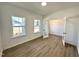 Spacious home office with wood-look flooring and natural light at 100 S Stonemill Trl # Homesite 234, Clayton, NC 27520