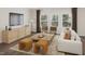 Relaxing living room with a comfortable sofa, coffee table, and built-in media console at 100 S Stonemill Trl # Homesite 234, Clayton, NC 27520