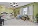 Comfortable sitting area with light beige couch and decor at 106 Skygrove Dr, Clayton, NC 27527