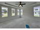Bright and airy bedroom with a tray ceiling, large windows, and recessed lighting for a serene atmosphere at 107 Pretty Run Branch Ln, Wendell, NC 27591