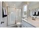 Clean bathroom with a shower and single vanity at 109 Magma Ln, Holly Springs, NC 27540