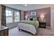 Charming bedroom with a soccer-themed wall and full bed at 109 Magma Ln, Holly Springs, NC 27540