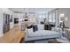 Bright living room features hardwood floors and comfy seating at 109 Magma Ln, Holly Springs, NC 27540