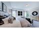 Luxurious main bedroom with king-size bed and large windows at 109 Magma Ln, Holly Springs, NC 27540