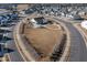 Aerial view of a neighborhood with a community clubhouse at 120 Rider Race Bnd, Holly Springs, NC 27540