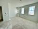 Spacious bedroom with three windows and light walls at 121 S Stone Mill W Trl # 240, Clayton, NC 27520