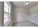 Bright bedroom with carpeted floor, window, and neutral walls at 15 Michael Ct, Erwin, NC 28339