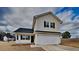 Two-story house with attached garage and landscaped yard at 15 Michael Ct, Erwin, NC 28339
