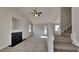Spacious living room with fireplace and stairs at 15 Michael Ct, Erwin, NC 28339