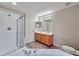 Double vanity bathroom with a shower and a separate tub at 1527 Haywards Heath Ln, Apex, NC 27502