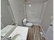 Bathroom features a tub, toilet, and vanity at 1527 Haywards Heath Ln, Apex, NC 27502