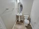 Simple half bathroom with pedestal sink and toilet at 1527 Haywards Heath Ln, Apex, NC 27502