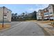 Community view showing townhouses and landscaping at 1527 Haywards Heath Ln, Apex, NC 27502