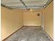 Attached garage with automatic door opener at 1527 Haywards Heath Ln, Apex, NC 27502