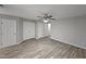Large main bedroom with laminate flooring and ample closet space at 1527 Haywards Heath Ln, Apex, NC 27502