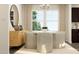 Modern dining room with a round table, chairs, and large window at 155 Hanover Dr, Sanford, NC 27330