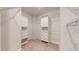 Large walk-in closet with shelving and drawers at 2024 Chipley Dr, Cary, NC 27519