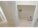 Convenient laundry area with built-in shelving at 2615 Barwick Dr, Durham, NC 27704