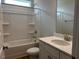 Sparkling clean bathroom with a tub, shower, toilet, and bright countertop space at 292 Weddington Way, Benson, NC 27504
