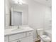 Clean bathroom boasts a single sink vanity, toilet, and a shower-tub combo at 292 Weddington Way, Benson, NC 27504