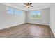 Spacious bedroom with hardwood floors and large windows at 292 Weddington Way, Benson, NC 27504