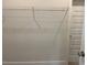 Walk in closet with multiple rods for hanging clothes, and wire shelving at 292 Weddington Way, Benson, NC 27504