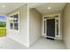 Inviting home entrance with a classic front door and ample natural light at 292 Weddington Way, Benson, NC 27504