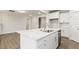 Open kitchen with island, stainless steel dishwasher, and granite countertops at 292 Weddington Way, Benson, NC 27504