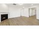 Spacious living room featuring a fireplace, hardwood floors, and recessed lighting at 292 Weddington Way, Benson, NC 27504