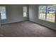 Comfortable bedroom with large windows offering plenty of natural light at 308 Whispering Way, Sanford, NC 27330