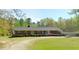 Ranch house on a large lot with mature trees at 3600 Nc 561, Louisburg, NC 27549