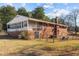 Brick rancher with a sunroom and fenced backyard at 3969 Carbonton Rd, Sanford, NC 27330