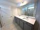 Spacious bathroom features a double sink vanity and a large mirror at 45 Calabria Ct, Franklinton, NC 27525