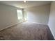 Spacious bedroom with neutral walls, carpet, and natural light from a single window at 45 Calabria Ct, Franklinton, NC 27525