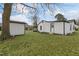 White house exterior with shed and backyard at 521 Mill St, Smithfield, NC 27577